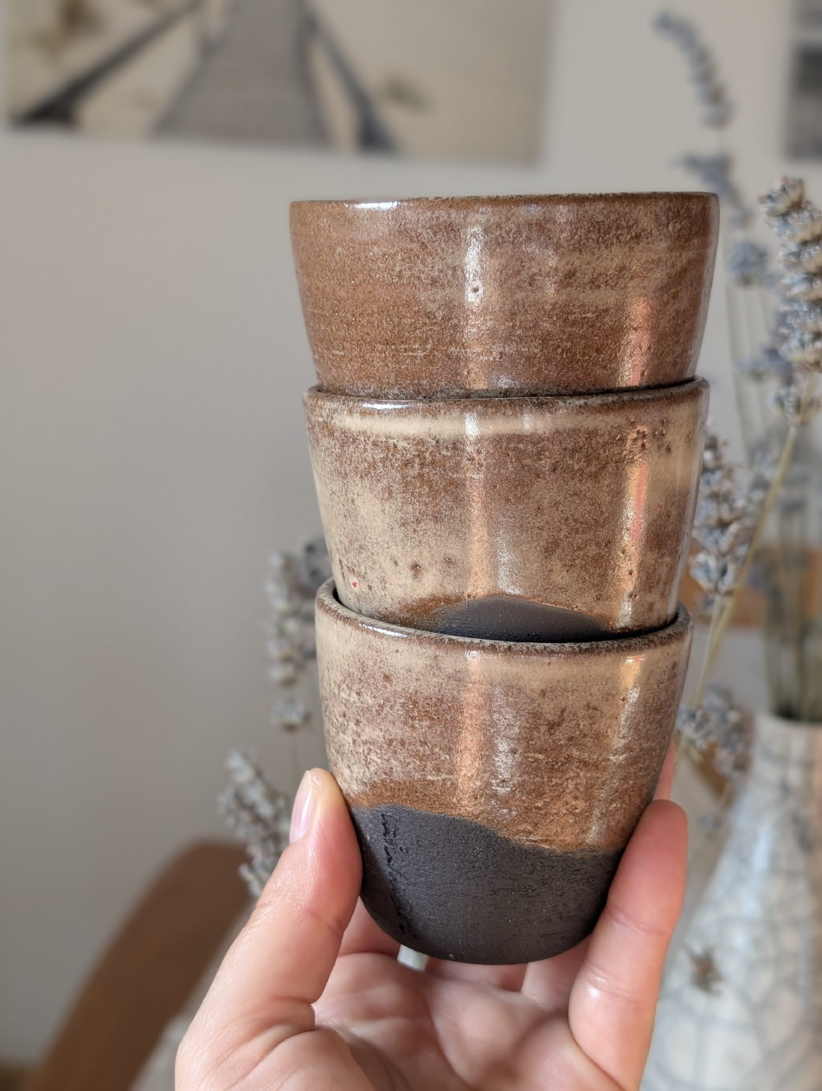 black and beige macchiato cups